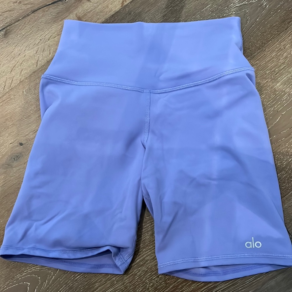 ALO YOGA bike shorts in a light purple lavender color